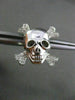 ESTATE .20CT DIAMOND 14KT WHITE GOLD PIRATE SKULL SCREW BACK STUD EARRINGS F/G