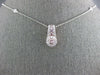 ESTATE .68CT WHITE & PINK DIAMOND 18K WHITE & ROSE GOLD HALO BY THE YARD PENDANT