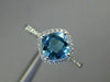 ESTATE 1.29CT DIAMOND & AAA BLUE TOPAZ 14KT WHITE GOLD 3D CUSHION FUN LOVE RING