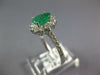 1.41CT DIAMOND & AAA EMERALD 14KT WHITE GOLD OVAL & ROUND FLOWER ENGAGEMENT RING
