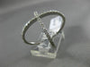 ESTATE LARGE .61CT DIAMOND 14KT WHITE GOLD 3D CRISS CROSS X INFINITY LOVE RING