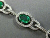 ESTATE WIDE 7.06CT DIAMOND & AAA EMERALD 14KT WHITE GOLD 3D HALO TENNIS BRACELET