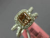 ESTATE 1.24CT WHITE & BROWNISH ORANGE DIAMOND 18KT WHITE & ROSE GOLD LOVE RING