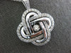 ESTATE LARGE 1.16CT DANCING DIAMOND 14KT WHITE GOLD 3D LOVE KNOT FLOWER PENDANT