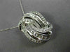 LARGE .75CT ROUND & BAGUETTE DIAMOND 14KT WHITE GOLD LOVE KNOT MULTI ROW PENDANT