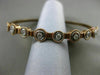 ESTATE .60CT DIAMOND 14KT WHITE & ROSE GOLD 3D 9 STONE FLEXIBLE BANGLE BRACELET