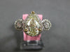 LARGE 2.21CT WHITE & FANCY YELLOW DIAMOND 18KT 2 TONE GOLD HALO ENGAGEMENT RING