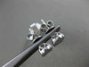 ESTATE .64CT DIAMOND 18K WHITE GOLD 3D SOLITAIRE HALO CLUSTER STUD EARRINGS F/G