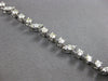 3.15CT DIAMOND 14KT WHITE GOLD 3D ROUND MULTI LEAF BY THE YARD TENNIS BRACELET