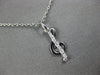 ESTATE .06CT DIAMOND 14KT WHITE GOLD CLASSIC MUSICAL NOTE FUN FLOATING PENDANT