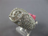 LARGE 5.12CT DIAMOND 18KT WHITE GOLD ROUND & BAGUETTE CRISS CROSS INFINITY RING