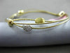 ESTATE .42CT DIAMOND 14KT TWO TONE GOLD HAMMERED BY THE YARD BANGLE BRACELET