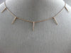 ESTATE .15CT ROUND DIAMOND 14KT ROSE GOLD 3D BY THE YARD SPIKY FLOATING PENDANT