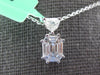 .69CT DIAMOND 18KT WHITE GOLD BAGUETTE KITE CUT CLUSTER OCTAGON FLOATING PENDANT