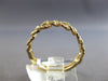 ESTATE .20CT DIAMOND 14KT YELLOW GOLD 5MM CLASSIC LOVE KNOT OVAL LINK FUN RING