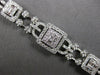 EXTRA LARGE 3.67CT DIAMOND 18KT WHITE GOLD 3D ROUND & BAGUETTE TENNIS BRACELET