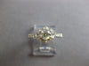 ESTATE .73CT DIAMOND 18KT WHITE GOLD 3D ROUND FLOWER ENGAGEMENT RING