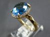 2.57CT DIAMOND & AAA BLUE TOPAZ 14KT YELLOW GOLD 3D OVAL HALO CLASSIC FUN RING