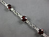 7.67CT DIAMOND & AAA GARNET 14KT WHITE GOLD 3D CUSHION & ROUND TENNIS BRACELET