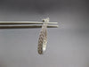 ESTATE .65CT DIAMOND 14K WHITE GOLD INSIDE OUT OVAL HUGGIE HOOP HANGING EARRINGS