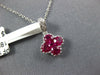 SMALL .78CT DIAMOND & AAA RUBY 18KT WHITE GOLD INVISIBLE 4 LEAF CLOVER PENDANT