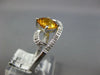 1.37CT DIAMOND & AAA CITRINE 14KT WHITE GOLD CUSHION & ROUND LOVE KNOT FUN RING