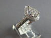 .70CT DIAMOND 18KT WHITE GOLD 3D CLASSIC ROUND CLUSTER PEAR SHAPE HALO LOVE RING