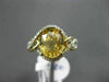 ESTATE 3.09CT DIAMOND & EXTRA FACET YELLOW TOPAZ 14KT YELLOW GOLD INFINITY RING