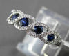 ESTATE .65CT DIAMOND & AAA SAPPHIRE 18KT WHITE GOLD INFINITY ETOILE RING