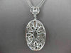 ESTATE LARGE 5.18CT BLACK & WHITE DIAMOND 18KT WHITE GOLD OVAL FLOATING NECKLACE