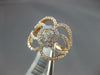 WIDE .97CT DIAMOND 14KT ROSE GOLD 3D ROUND & BAGUETTE INVISIBLE OVAL FLOWER RING