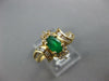 .68CT DIAMOND & AAA EMERALD 14KT YELLOW GOLD OVAL & ROUND FLOWER SWIRL FUN RING