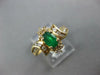 .68CT DIAMOND & AAA EMERALD 14KT YELLOW GOLD OVAL & ROUND FLOWER SWIRL FUN RING