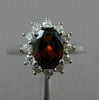 ESTATE 1.45CT DIAMOND & NATURAL GARNET 18KT WHITE GOLD OVAL HALO ENGAGEMENT RING