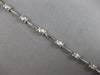 ESTATE .4CT DIAMOND 14K WHITE GOLD BEZEL ETOILE BY THE YARD LOVE TENNIS BRACELET