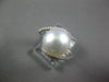 0.42CT DIAMOND & AAA SOUTH SEA PEARL 14KT WHITE GOLD CRISS CROSS LOVE KNOT RING