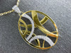 ESTATE LARGE .32CT DIAMOND 18KT WHITE & YELLOW GOLD OVAL CRISS CROSS FUN PENDANT
