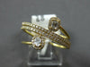 .50CT DIAMOND 18KT YELLOW GOLD ROUND BAGUETTE & OVAL MULTI ROW CRISS CROSS RING