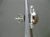 ESTATE .20CT DIAMOND 14KT WHITE GOLD PIRATE SKULL SCREW BACK STUD EARRINGS F/G