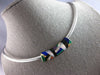LARGE .15CT DIAMOND & MULTI COLOR ENAMEL 14KT 2 TONE GOLD SLIDER OMEGA NECKLACE