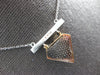 ESTATE LARGE .52CT DIAMOND 14KT WHITE & ROSE GOLD DIAMOND DISTRICT LOGO NECKLACE