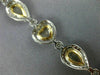 LARGE 13.95CT WHITE & FANCY YELLOW DIAMOND 18KT TWO TONE GOLD 3D TENNIS BRACELET