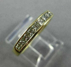 ESTATE .27CT DIAMOND 14KT YELLOW GOLD 9 STONE PRINCESS CHANNEL ANNIVERSARY RING