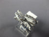 .68CT DIAMOND 14KT WHITE GOLD 3D ROUND & BAGUETTE MULTI ROW CRISS CROSS FUN RING