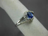 ESTATE .40CT DIAMOND & AAA TANZANITE 14KT WHITE GOLD CLASSIC LOVE KNOT FUN RING