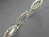 ESTATE WIDE 1.02CT DIAMOND 14K WHITE GOLD INFINITY SEMI ETERNITY BANGLE BRACELET