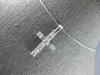 ESTATE .50CT DIAMOND 14KT WHITE GOLD 3D CLASSIC ROUND & BAGUETTE CROSS PENDANT