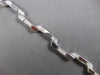 ESTATE .80CT DIAMOND 14KT WHITE GOLD ROUND GEOMETRICAL TRAPEZOID TENNIS BRACELET