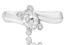 1.06CT DIAMOND PLATINUM 3D OVAL & ROUND CRISS CROSS SOLITAIRE ENGAGEMENT RING