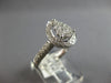 .70CT DIAMOND 18KT WHITE GOLD 3D CLASSIC ROUND CLUSTER PEAR SHAPE HALO LOVE RING